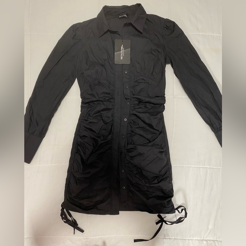 Black ruched long sleeve shirt dress , brand new with tags.